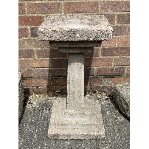 1487 - A vintage square shaped 1 piece concrete bird bath of stepped design. Approx. 62cm tall x 31cm wide ... 