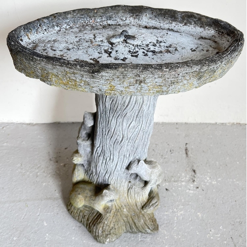 1498 - A large modern concrete garden bird bath modelled as squirrels on a tree trunk. With acorn design to... 