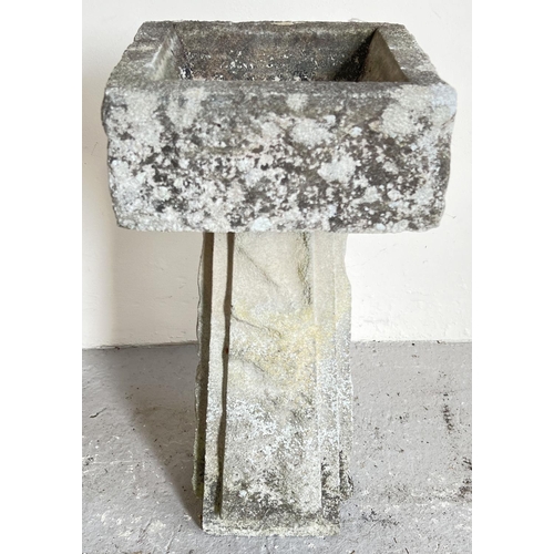 1503 - A small 2 sectional concrete bird bath of modern design. Approx. 48cm tall x 23cm wide.