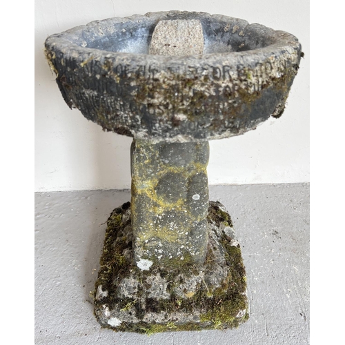 1511 - A vintage weathered concrete bird bath with pebbled effect base and bath with written verse. Bath is... 