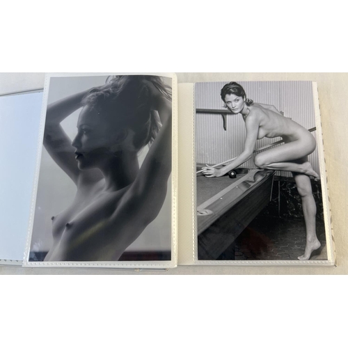 58 - An album containing 56 assorted colour and Black & white topless, nude and glamour model photographs... 