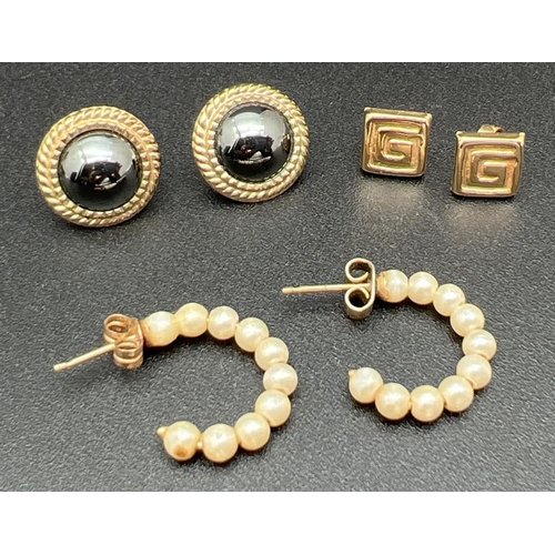 1081 - 3 pairs of gold and yellow metal earrings. A pair of half hoops with faux pearl beads, a pair of squ... 