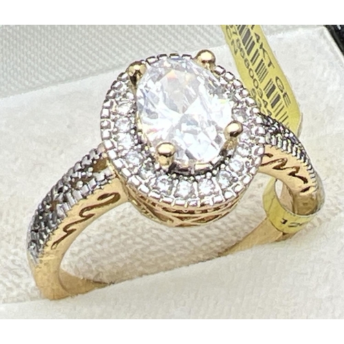 1093 - A 14ct gold plated Halo setting cocktail ring set with Swarovski crystals (brand new with tags). Cen... 