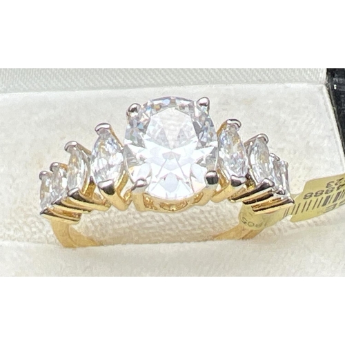 1096 - A 14ct gold plated cocktail ring set with clear Swarovski crystals, new with tags. Large central ova... 