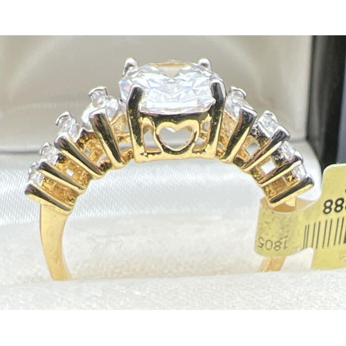 1096 - A 14ct gold plated cocktail ring set with clear Swarovski crystals, new with tags. Large central ova... 