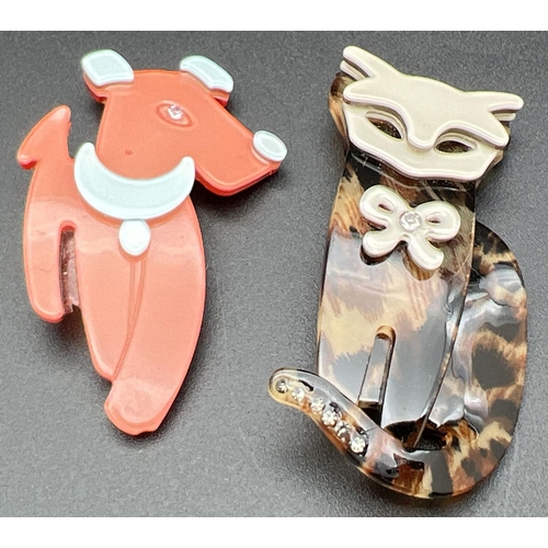 1099 - 2 Lea Stein style Lucite animal brooches. An orange and pale blue coloured dog together with an anim... 