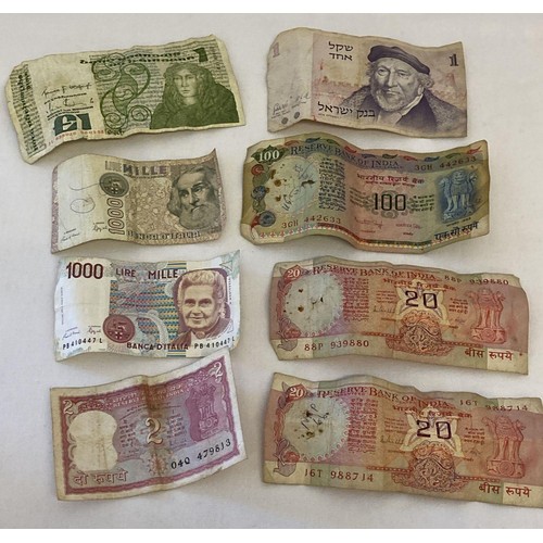 54 - A collection of 8 vintage foreign bank notes from India, Israel, Ireland and Italy.