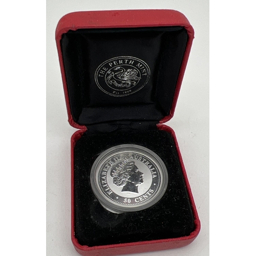 12 - A cased Perth Mint 2005 Year Of The Rooster Australian 50 cent silver proof coin, 1/2oz 999 silver. ... 