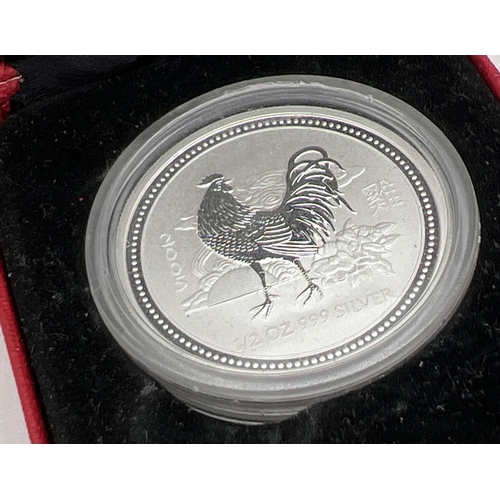 12 - A cased Perth Mint 2005 Year Of The Rooster Australian 50 cent silver proof coin, 1/2oz 999 silver. ... 