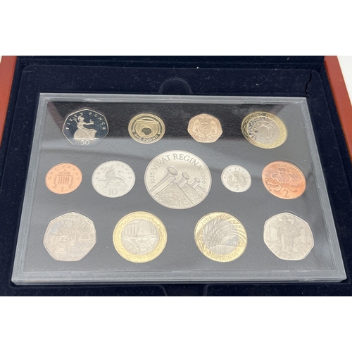15 - A cased set of 2006 Royal Mint Executive Proof Collection coins in a wooden presentation box. To inc... 