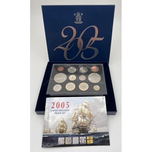 17 - A cased set of 2005 Royal Mint proof coins complete with information booklet and presentation box. C... 