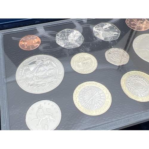17 - A cased set of 2005 Royal Mint proof coins complete with information booklet and presentation box. C... 