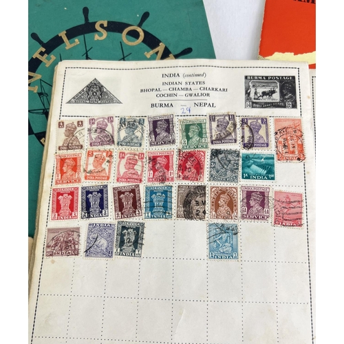 66 - A collection of used loose British and world stamps together with 3 vintage stamp albums. Nelson Sta... 