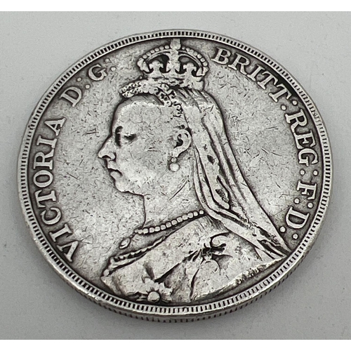 23 - A 1890 Jubilee head Victoria silver crown with George and the dragon to reverse.