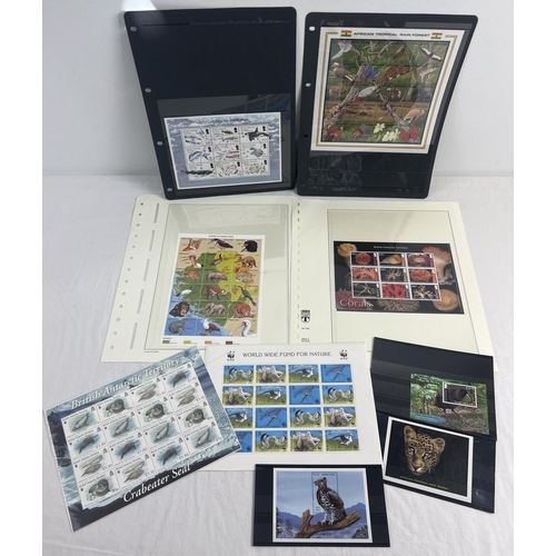 81 - A collection of assorted mint, never hinged stamp set sheets. Stamps are from Ghana, Sierra Leone, B... 