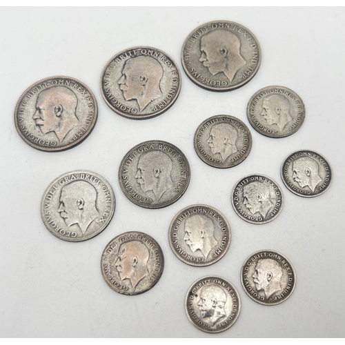 26 - 13 silver and half silver George V coins. To include three pence, sixpence, shilling and florin coin... 
