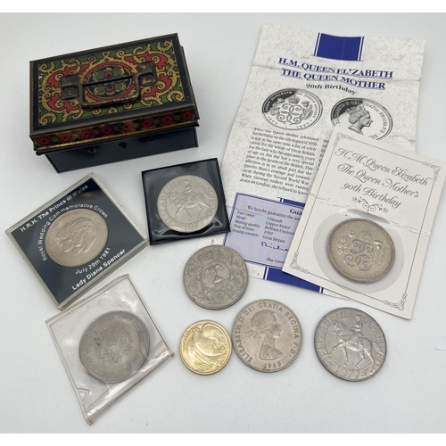 27 - A small collection of British coins and commemorative crowns together with a small vintage cash tin.... 