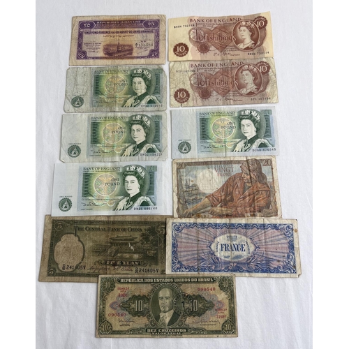 30 - 10 vintage British and foreign bank notes. To include 4 x Elizabeth II green £1 notes (all D series)... 