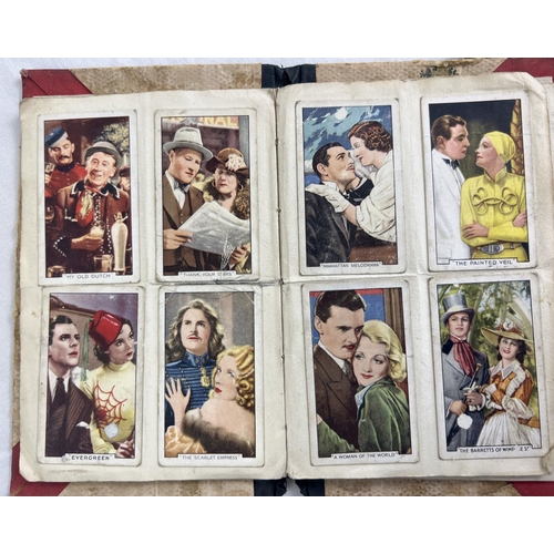 115 - 3 vintage cigarette card albums containing vintage card sets and parts sets together with a bag of l... 