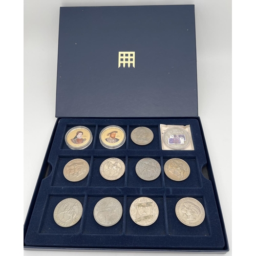 39 - 12 collectors coins and commemorative crowns in a Westminster coin collecting box with lift out tray... 