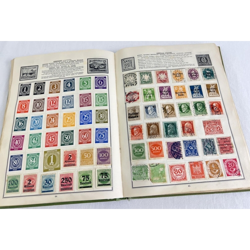 89 - A vintage Globe Trotter Stamp album of assorted world stamps to include franked & unfranked examples... 