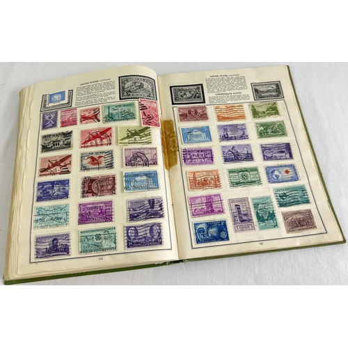 89 - A vintage Globe Trotter Stamp album of assorted world stamps to include franked & unfranked examples... 