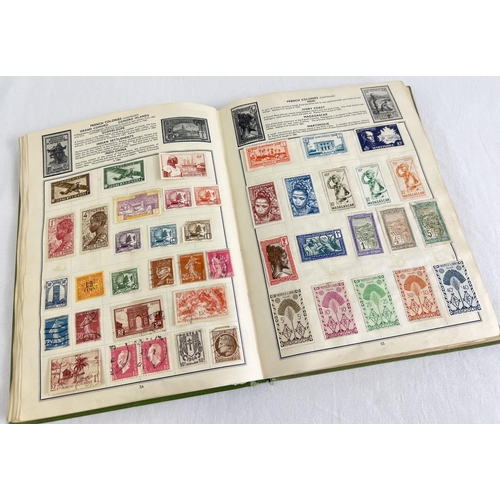 89 - A vintage Globe Trotter Stamp album of assorted world stamps to include franked & unfranked examples... 