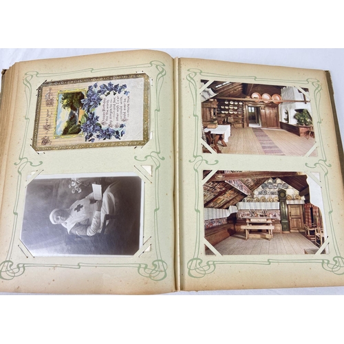 242 - An Art Nouveau postcard album containing 160+ assorted British & overseas postcards and greetings ca... 