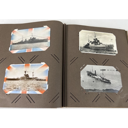 243 - An Art Deco postcard album containing 130+ assorted ship postcards & photographs.