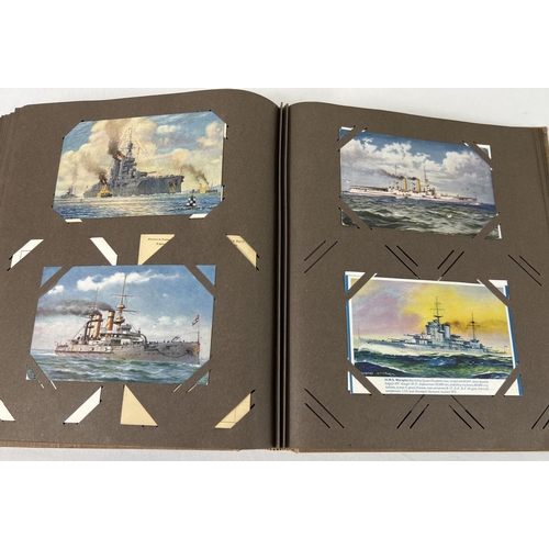 243 - An Art Deco postcard album containing 130+ assorted ship postcards & photographs.