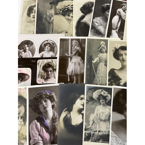 244 - A collection of 66 assorted vintage postcards featuring actors, actresses and beauties of the day. T... 