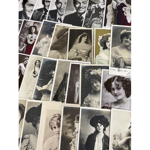 244 - A collection of 66 assorted vintage postcards featuring actors, actresses and beauties of the day. T... 