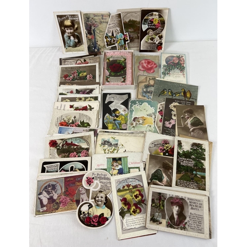 246 - A collection of 95 assorted Victorian, Edwardian & vintage greetings cards.