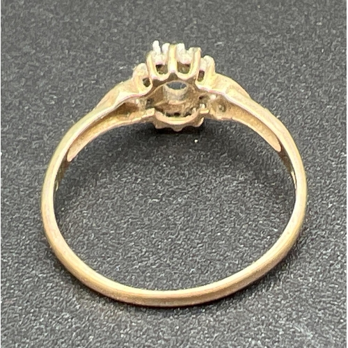 1080 - A 9ct gold vintage dress ring set with small round cut diamonds. Central stone missing and one small... 