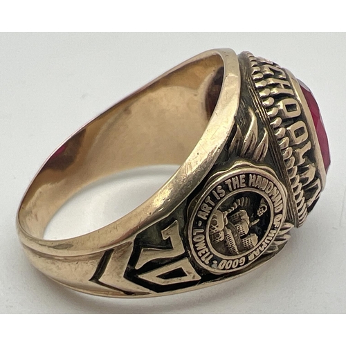 1025 - A vintage 1970 10ct gold American Lowell High School signet ring set with an oval red stone - tests ... 