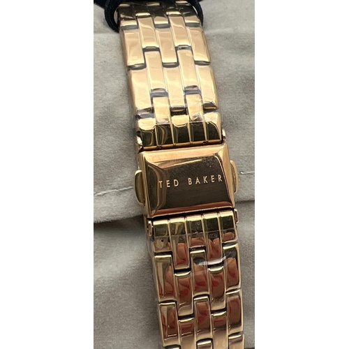 1153 - A boxed Ted Baker Fitzrovia Charm wristwatch, complete with tags, protective plastic coverings and i... 