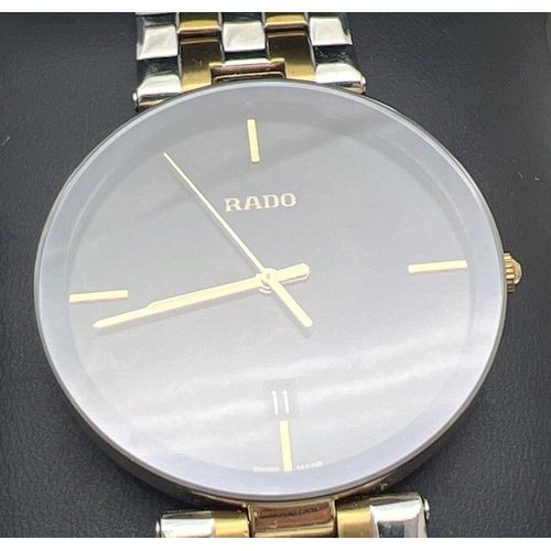 1157 - A boxed men's Rado Florence quartz wristwatch 15448866. Gold and silver tone stainless steel strap a... 