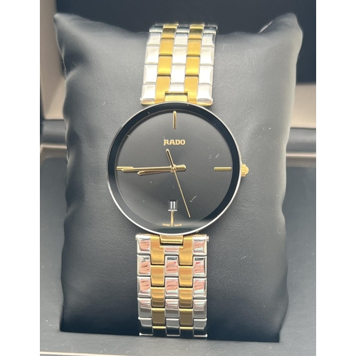 1157 - A boxed men's Rado Florence quartz wristwatch 15448866. Gold and silver tone stainless steel strap a... 