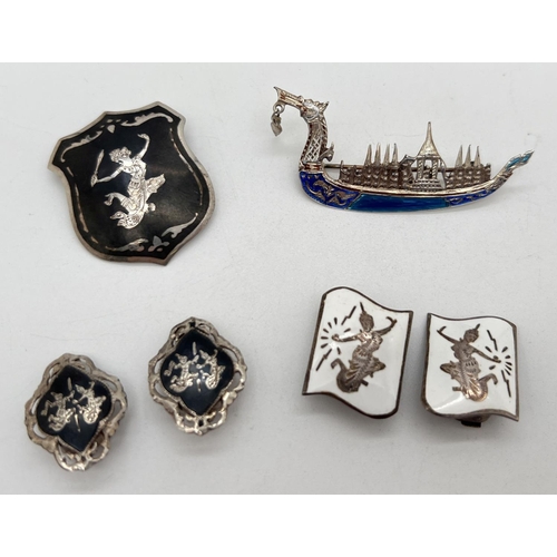 1048 - 4 items of Siam silver jewellery. A dragon boat brooch with blue enamel detail; and a brooch, a pair... 