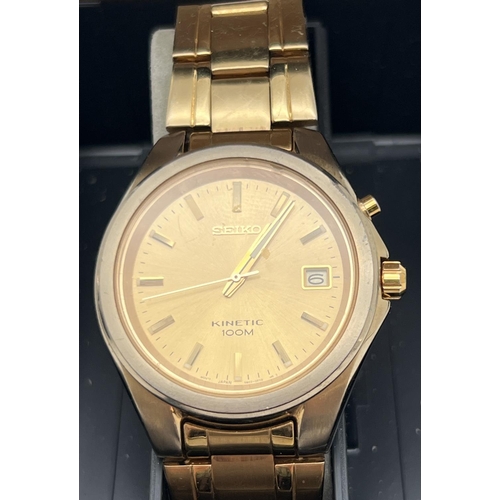 1163 - A boxed Seiko 5M62-OD50 A4 Kinetic gold tone wristwatch with original paperwork. Gold tone face and ... 