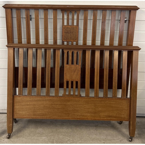 1434 - An Edwardian double bed frame with inlaid detail, slatted head & foot board, complete with bed irons... 