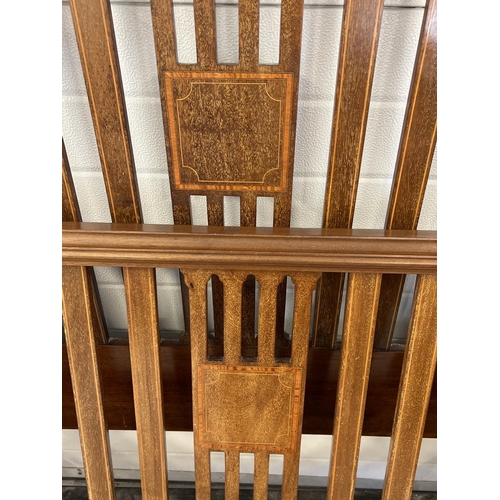 1434 - An Edwardian double bed frame with inlaid detail, slatted head & foot board, complete with bed irons... 