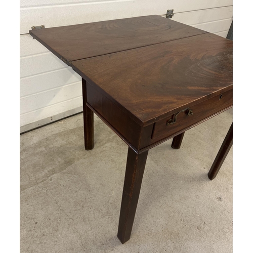 1436 - A small Georgian fold out tea table with single draw and pull-out gate leg support. Angled square le... 