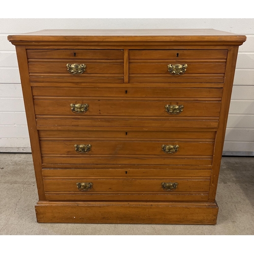 1439 - An Edwardian satin wood 2 over 3 chest of drawers with brass drop down handles. Approx. 106cm tall x... 