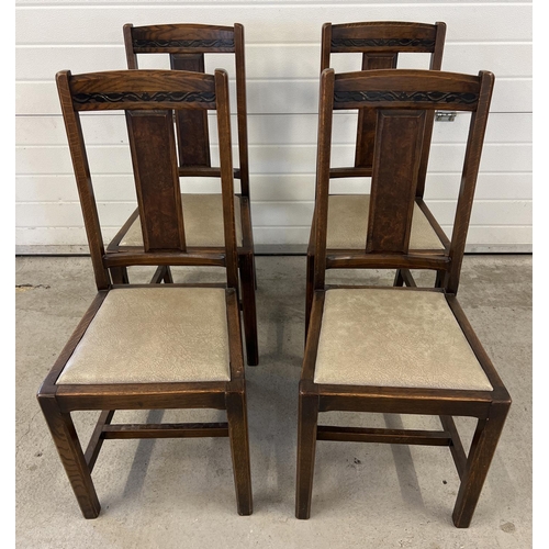 1446 - A set of 4 vintage Art Deco dining chairs with carved floral detail to backs. Drop in seats upholste... 