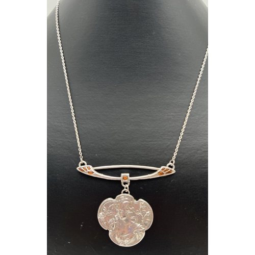 1065 - A 925 silver Art Nouveau design fixed pendant necklace with hanging pendant featuring a stylised mai... 