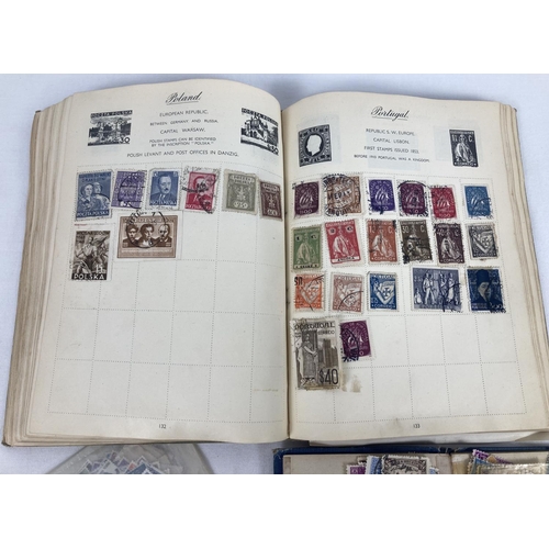 66A - 2 vintage stamp albums containing assorted world stamps, together with a few loose stamps.