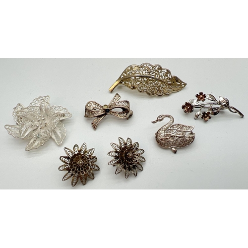 1406 - A small collection of 925 silver filigree style jewellery, mostly brooches. To include leaf brooch, ... 