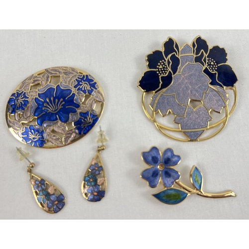 1130 - A small collection of Fish & Crown enamelled jewellery. A large circular floral brooch, a flower ste... 