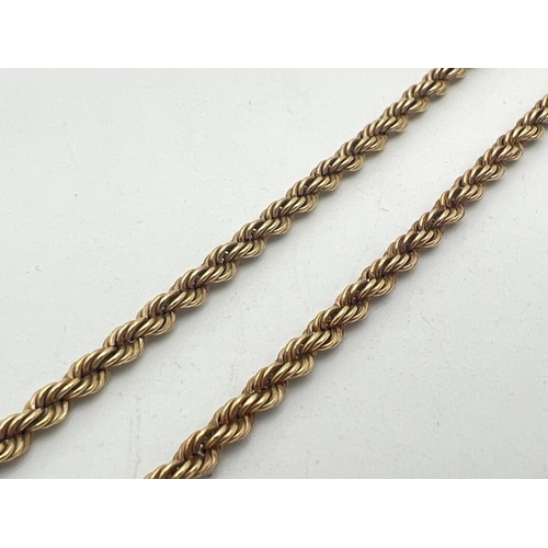 1079 - An 18 inch 9ct gold rope chain with spring ring clasp. Gold mark to clasp and fixings. Total weight ... 